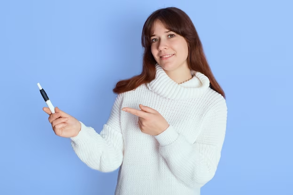 A woman pointing to a smart pen